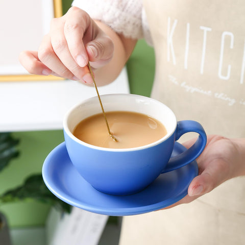 Yundu latte saucer blue accompanies blue cup and prevents spills