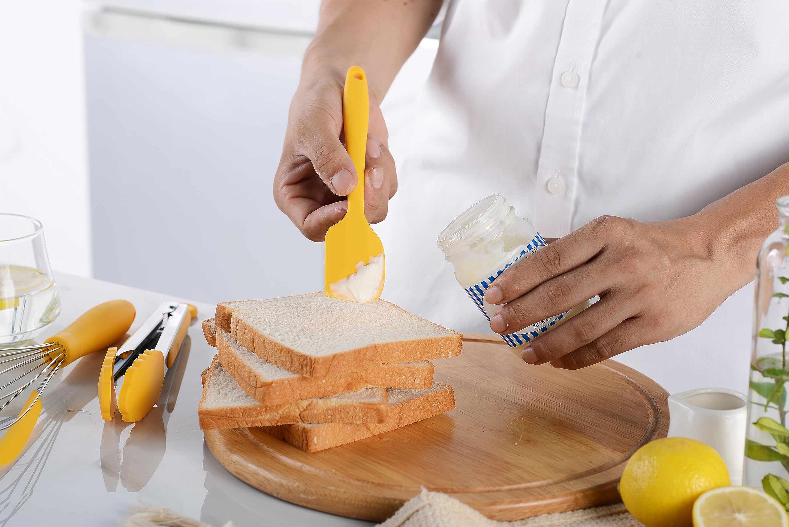 YunWuCloud silicone spoon in yellow, nonstick friendly for cookware surfaces