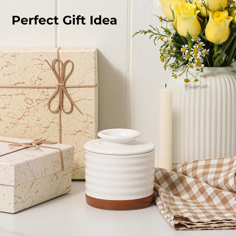 Y YHY butter crock in off-white complements any kitchen decor.