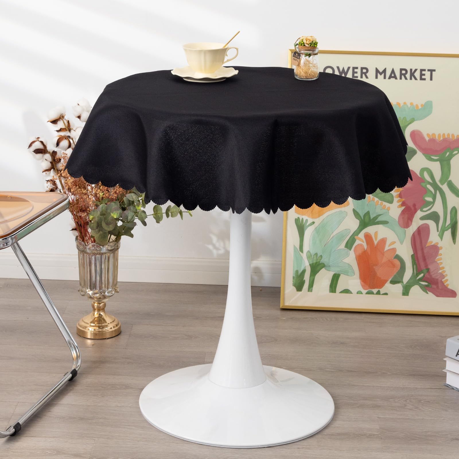 YZKITM small round black tablecloth on dining table elevating a formal setting.