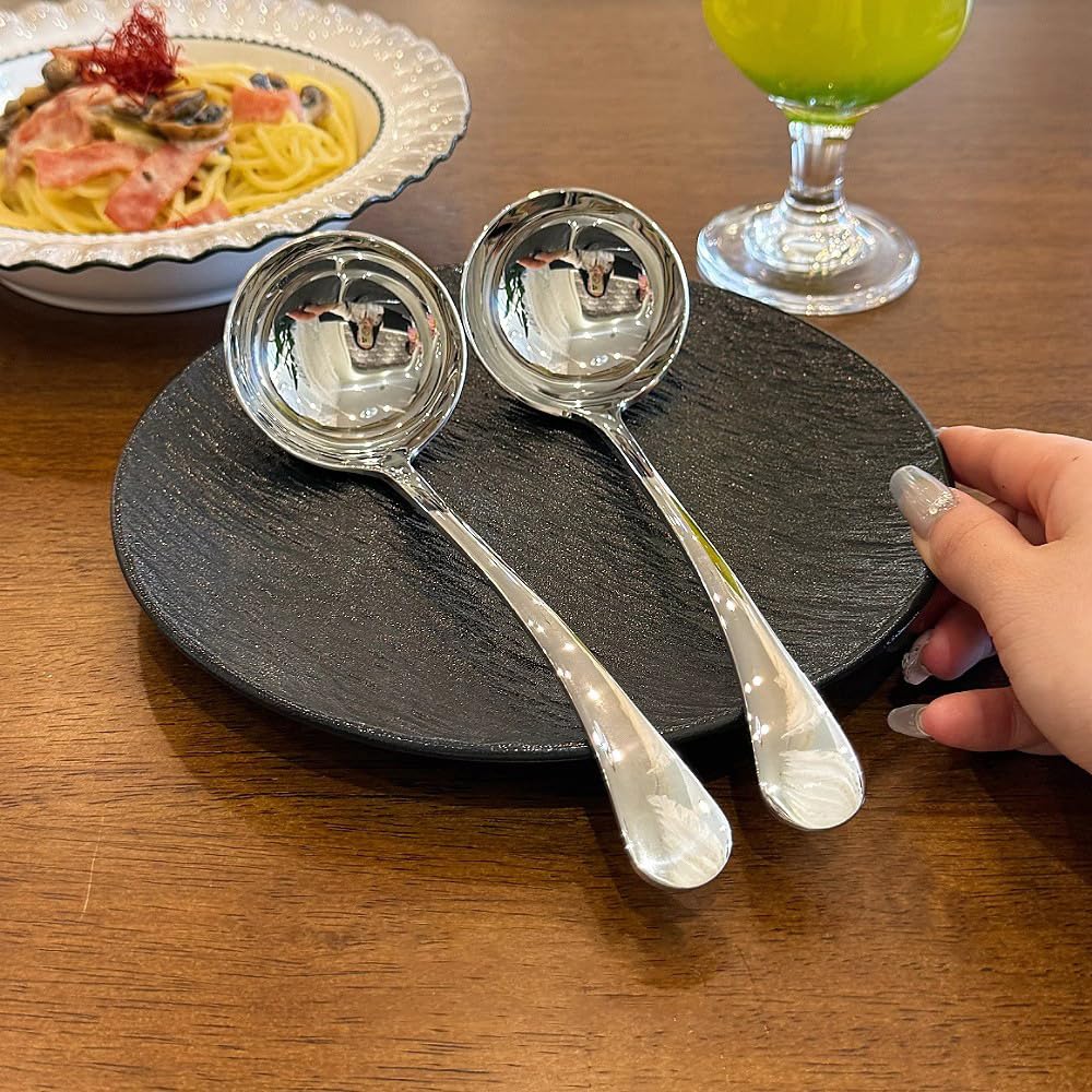 ZDFQly multi-use ladle suitable for hot pots, gravies, and dressings.