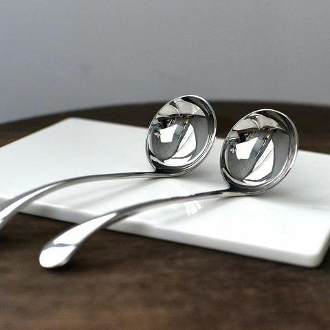 ZDFQly sauce-serving ladle helps portion sauces neatly at the table.
