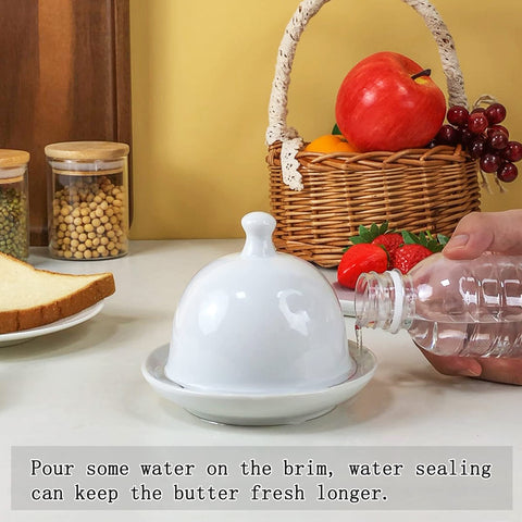 Bell-shaped white ZEBERBO ceramic butter dish for stylish kitchen presentation
