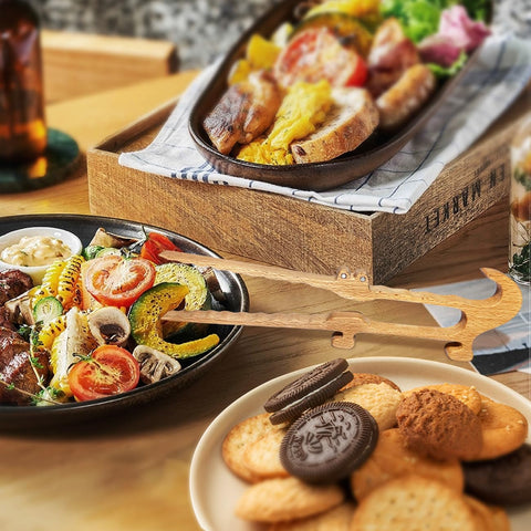 Zeikiwe kitchen gadget tong with fridge magnet for easy storage.