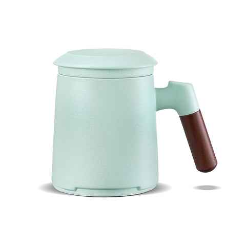 ZENS tea cup with infuser and lid, embossed ceramic design for easy loose leaf brewing.