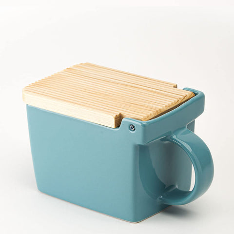 ZERO JAPAN Bee House on counter keeps salt accessible during meals.