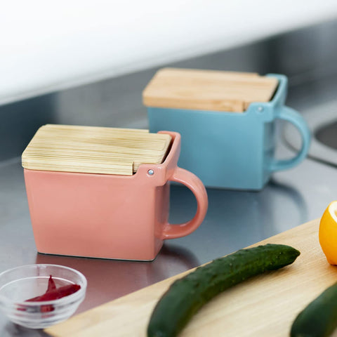 ZERO JAPAN Bee House salt box offers space for spices on the counter.