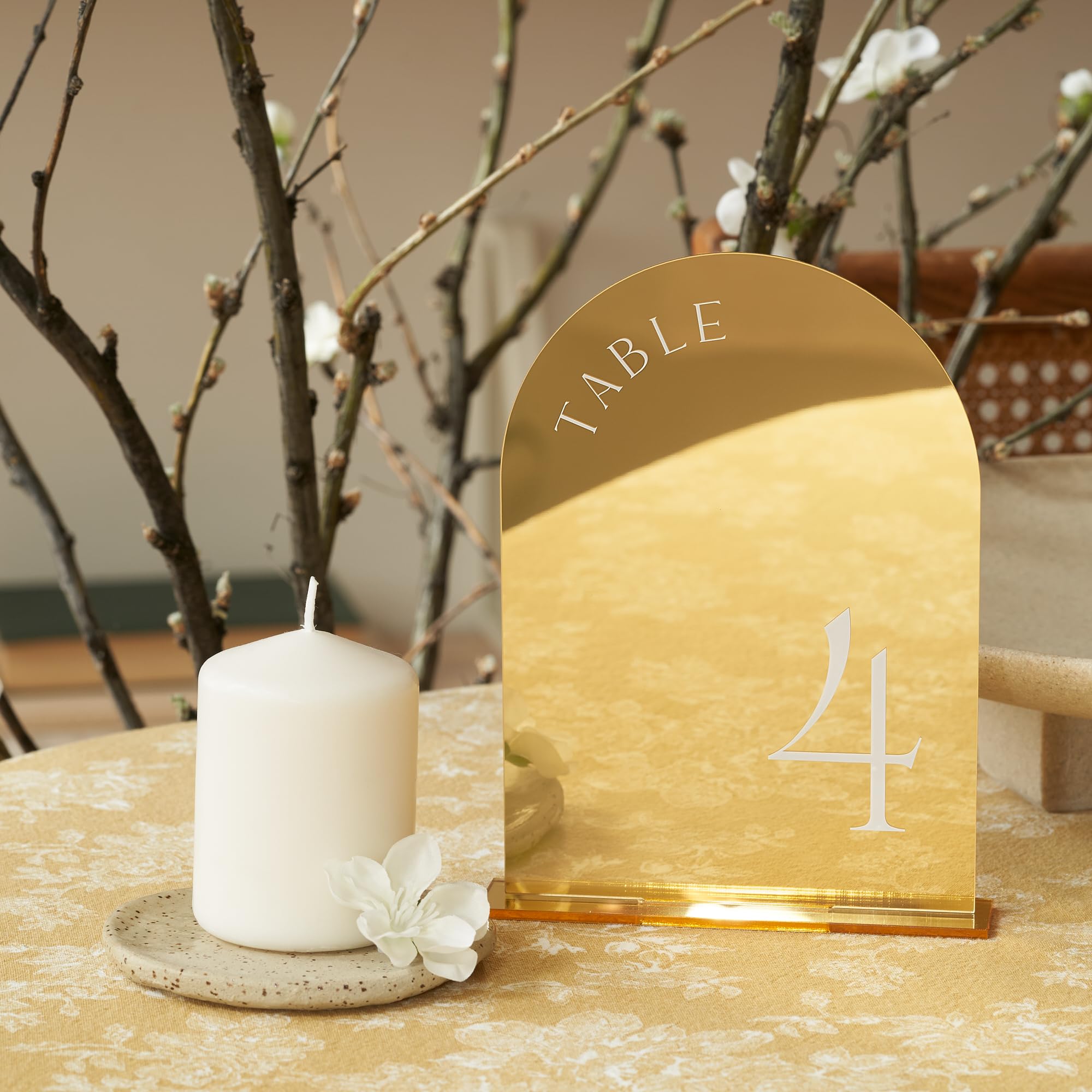 ZICOTO gold table number stands provide secure upright display.