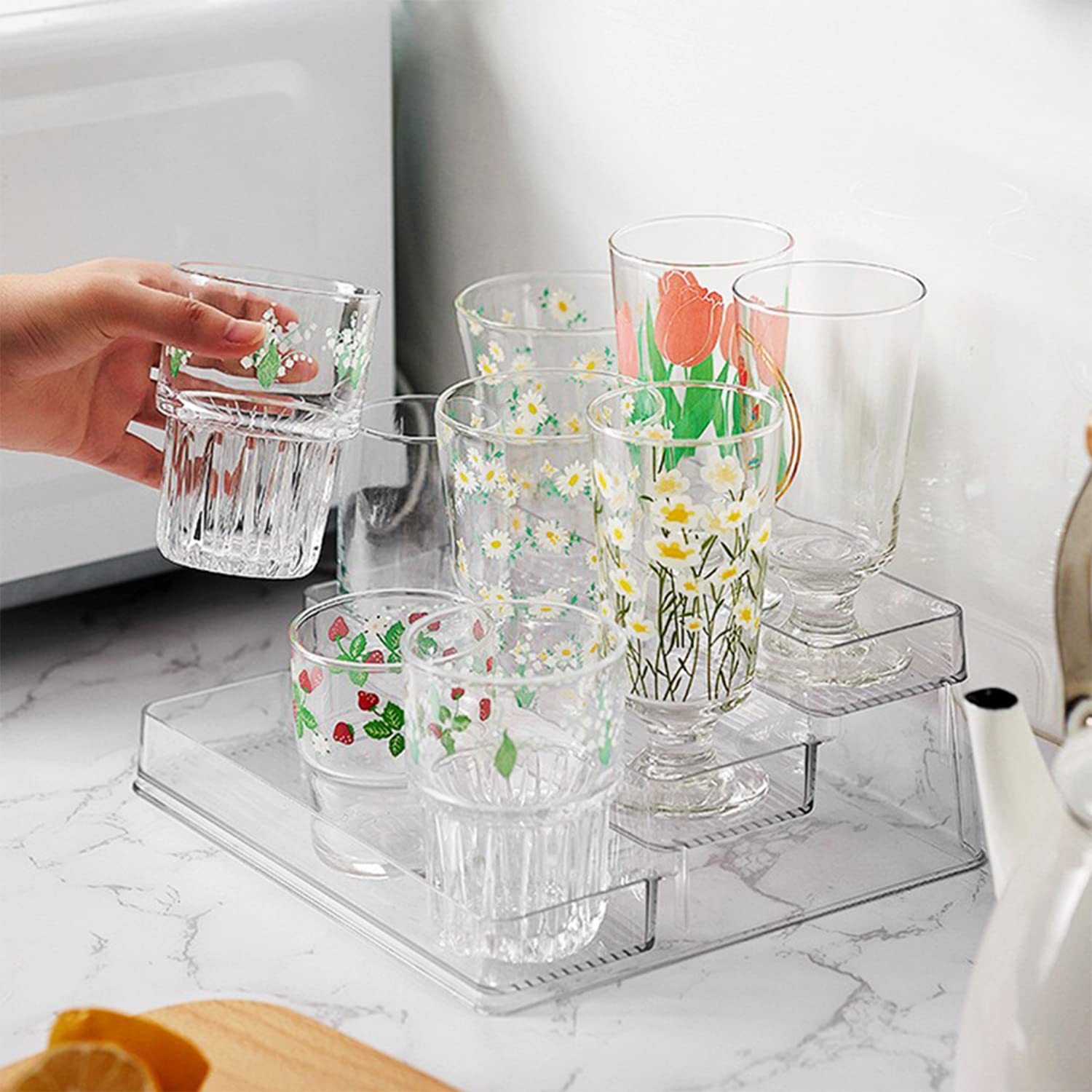 Zilphoba deep shelves hold large and small bottles for versatile storage.