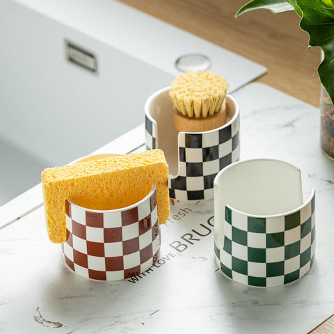 Zoeeker checkered-pattern sink accessory keeps countertops neat and reflective.