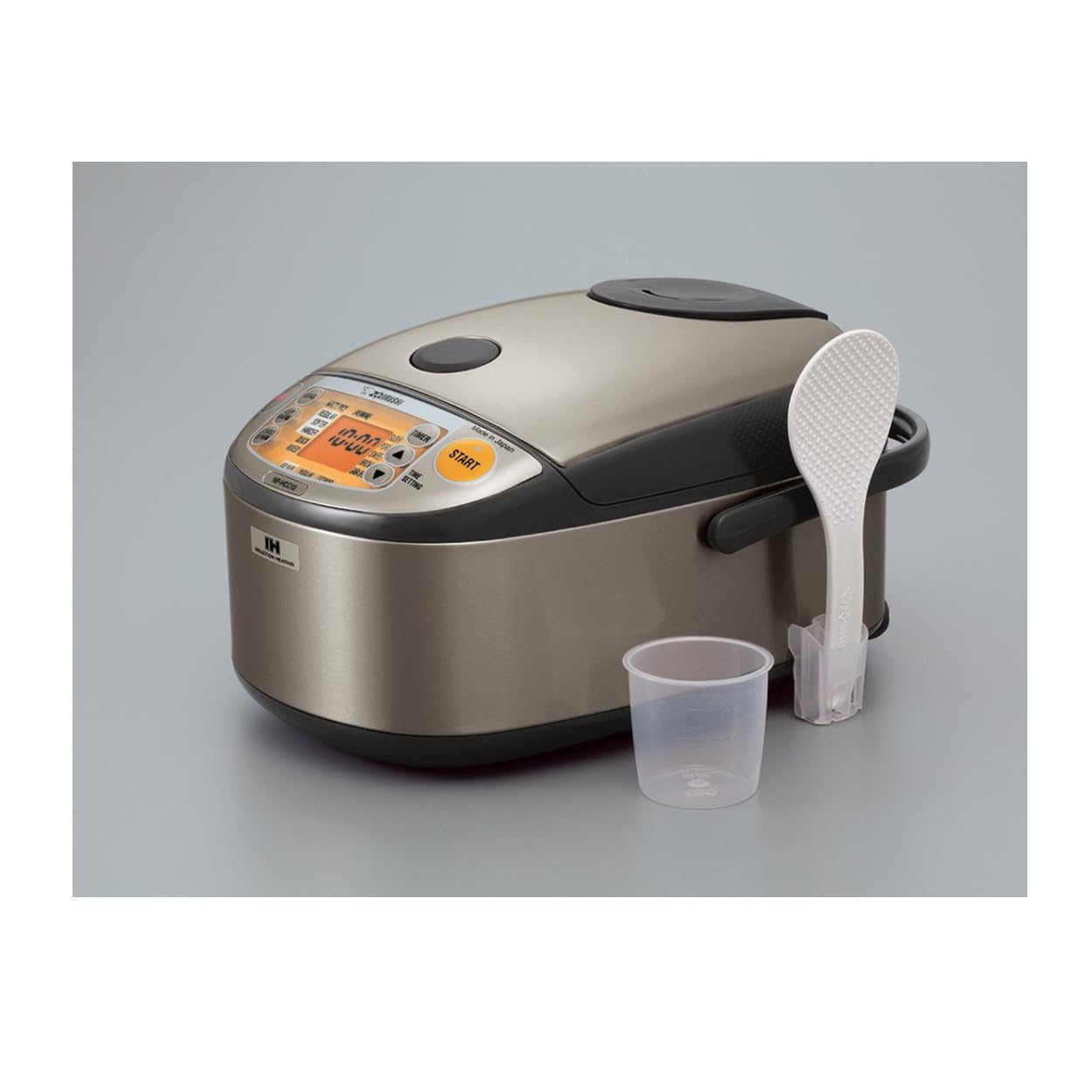 Zojirushi NP-HCC18XH LCD control panel highlights clear timer and settings for precision.