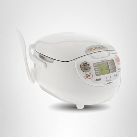 In-use view of Zojirushi NS-ZCC10 producing fluffy rice.