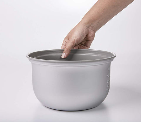 Zojirushi rice cooker metallic gray with triple heater for even cooking.