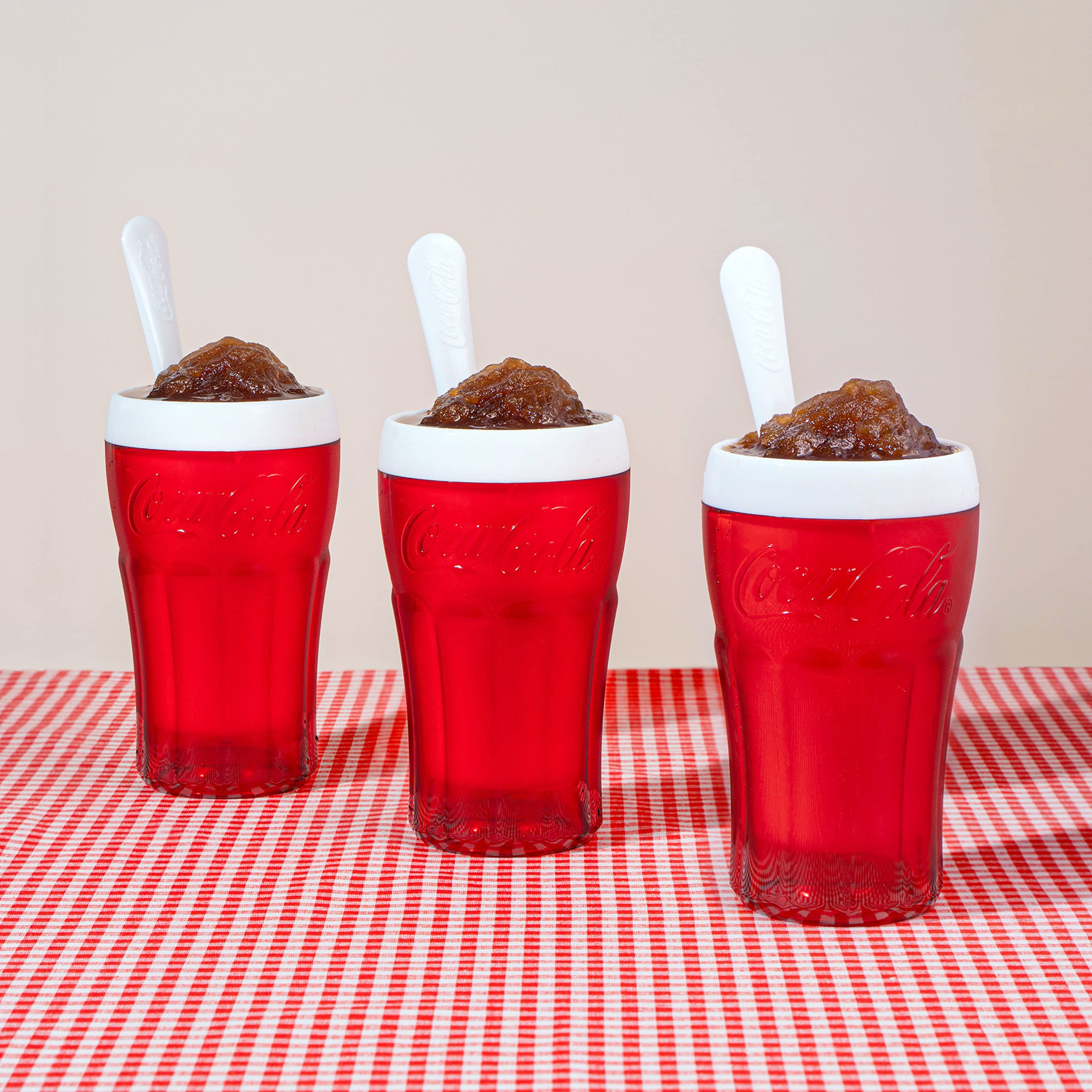 ZOKU Coca-Cola Float & Slushie Maker serves a single serving in a compact cup