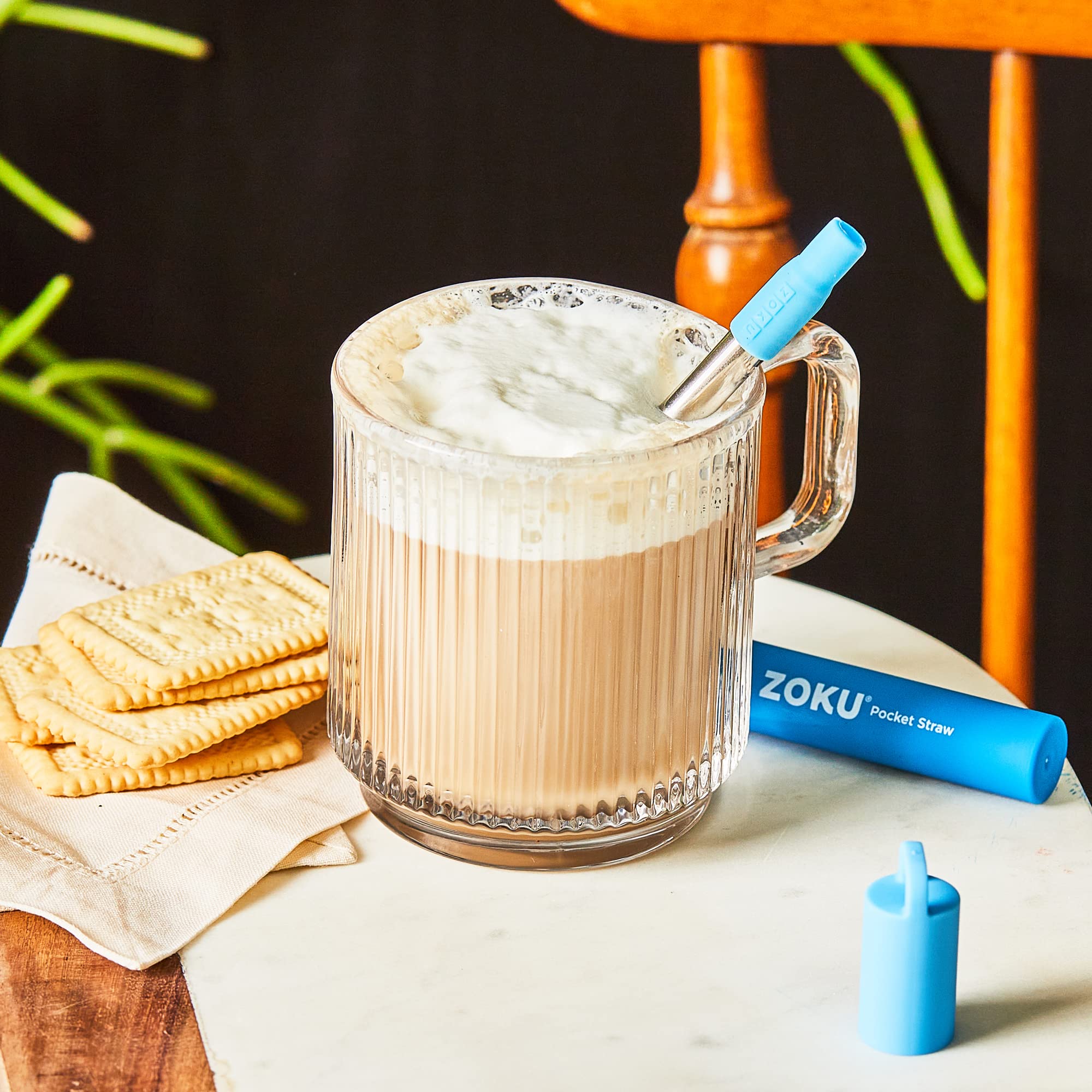 ZOKU straw in a glass with ice demonstrating beverage versatility