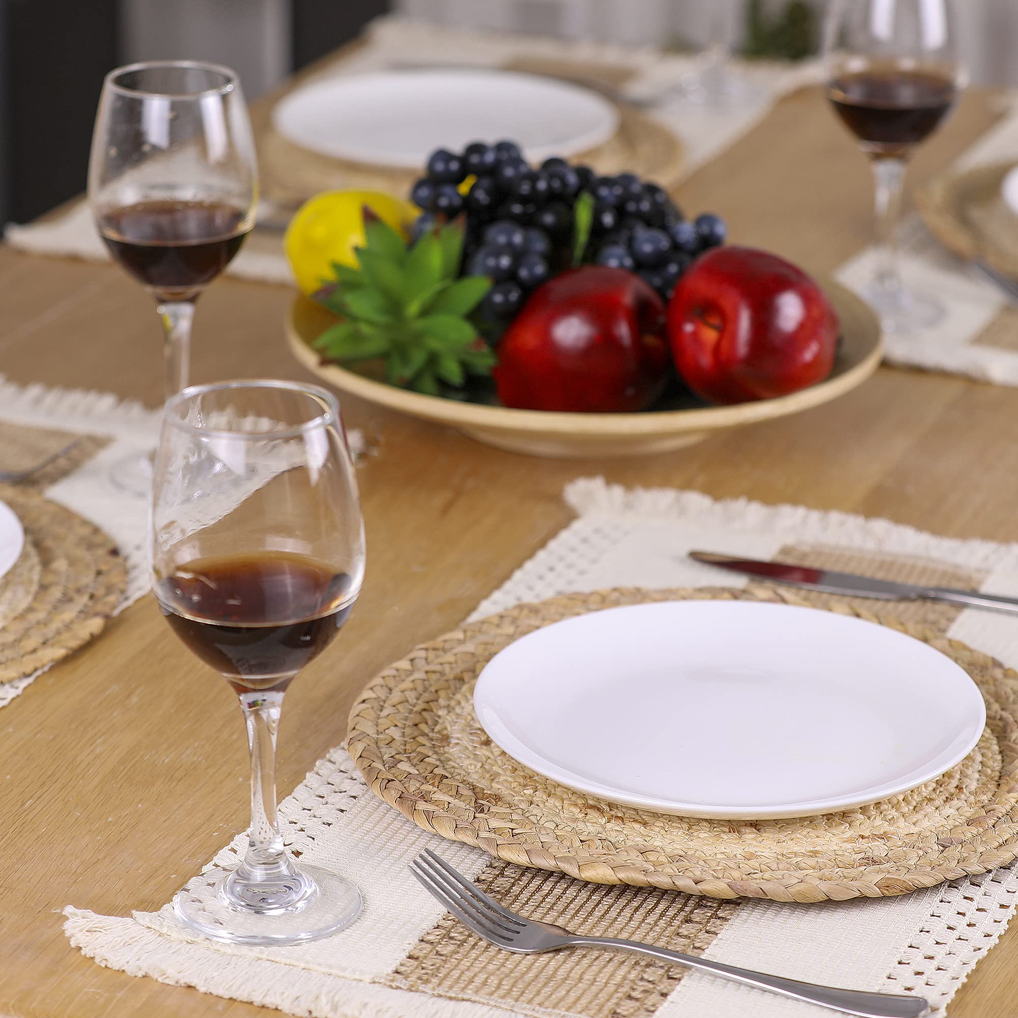 Zology round placemats, 11.8 inch diameter, woven with water hyacinth and corn husk, protect surfaces during meals.