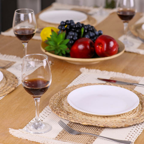 Zology round placemats, 11.8 inch diameter, woven with water hyacinth and corn husk, protect surfaces during meals.