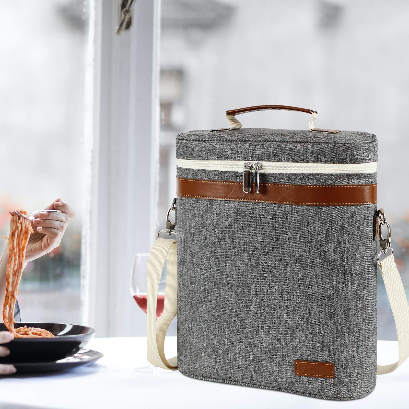 ZORMY tote features secure zipper and clasp for reliable closure.