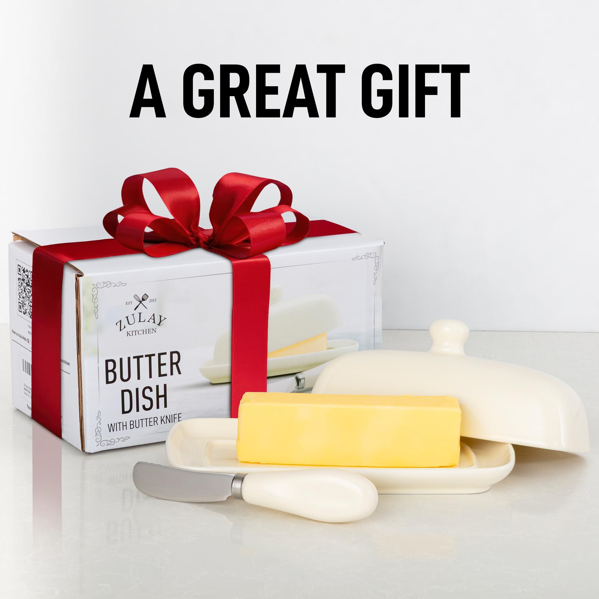 Zulay butter dish with raised edge ridge helps keep butter steady.