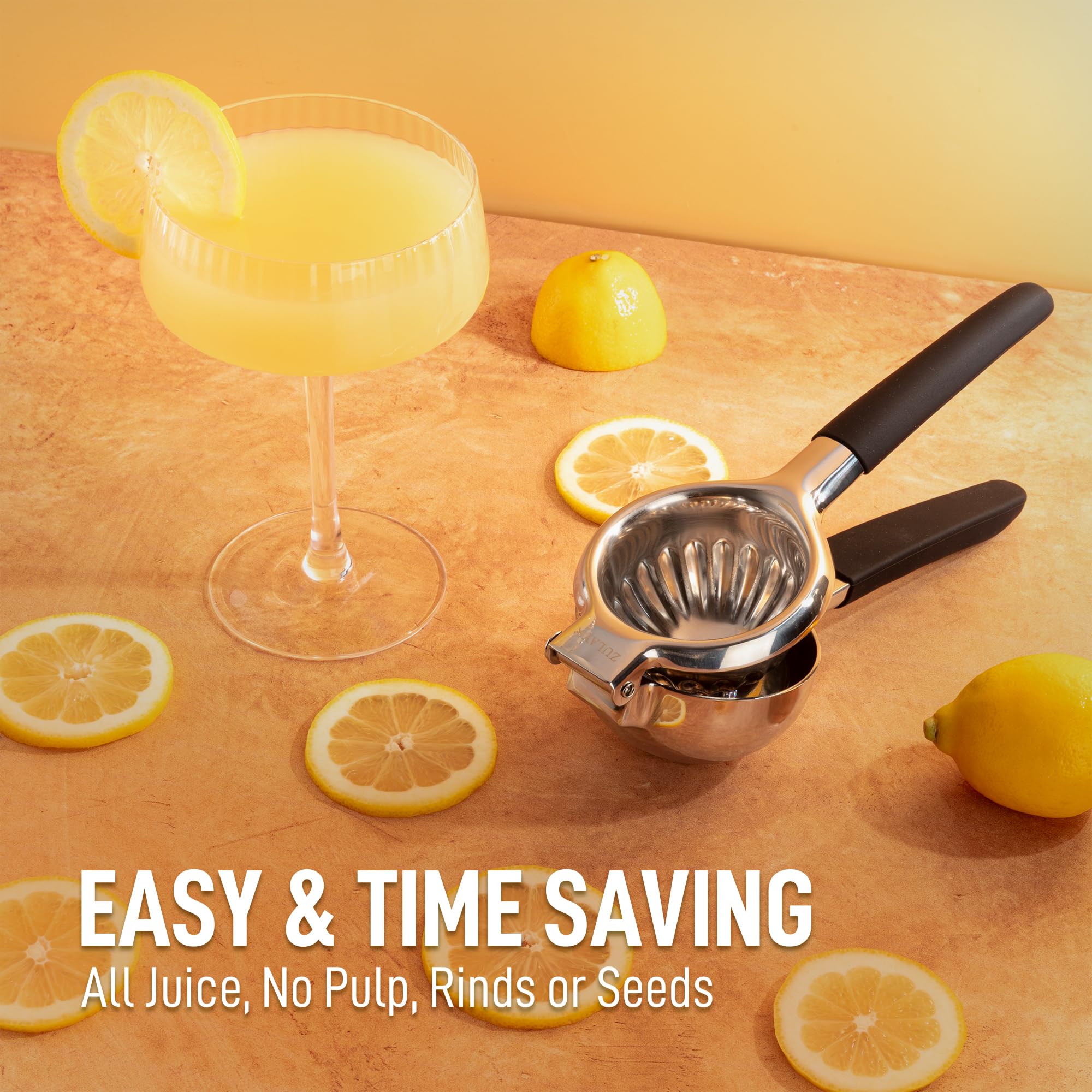 Heavy-duty stainless steel bowl of Zulay squeezer juicing large lemons and limes