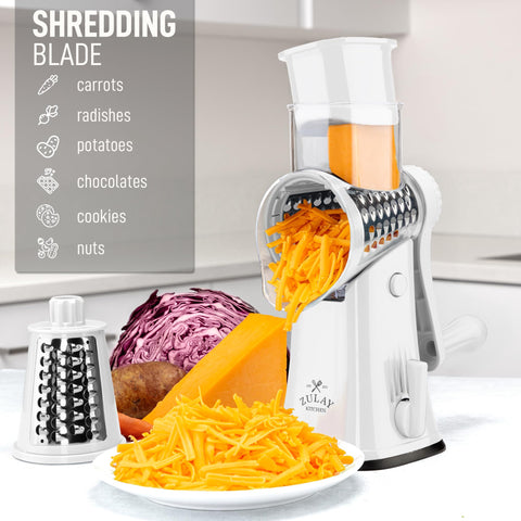 Hopper loading on Zulay Kitchen grater with food pusher for safe feeding