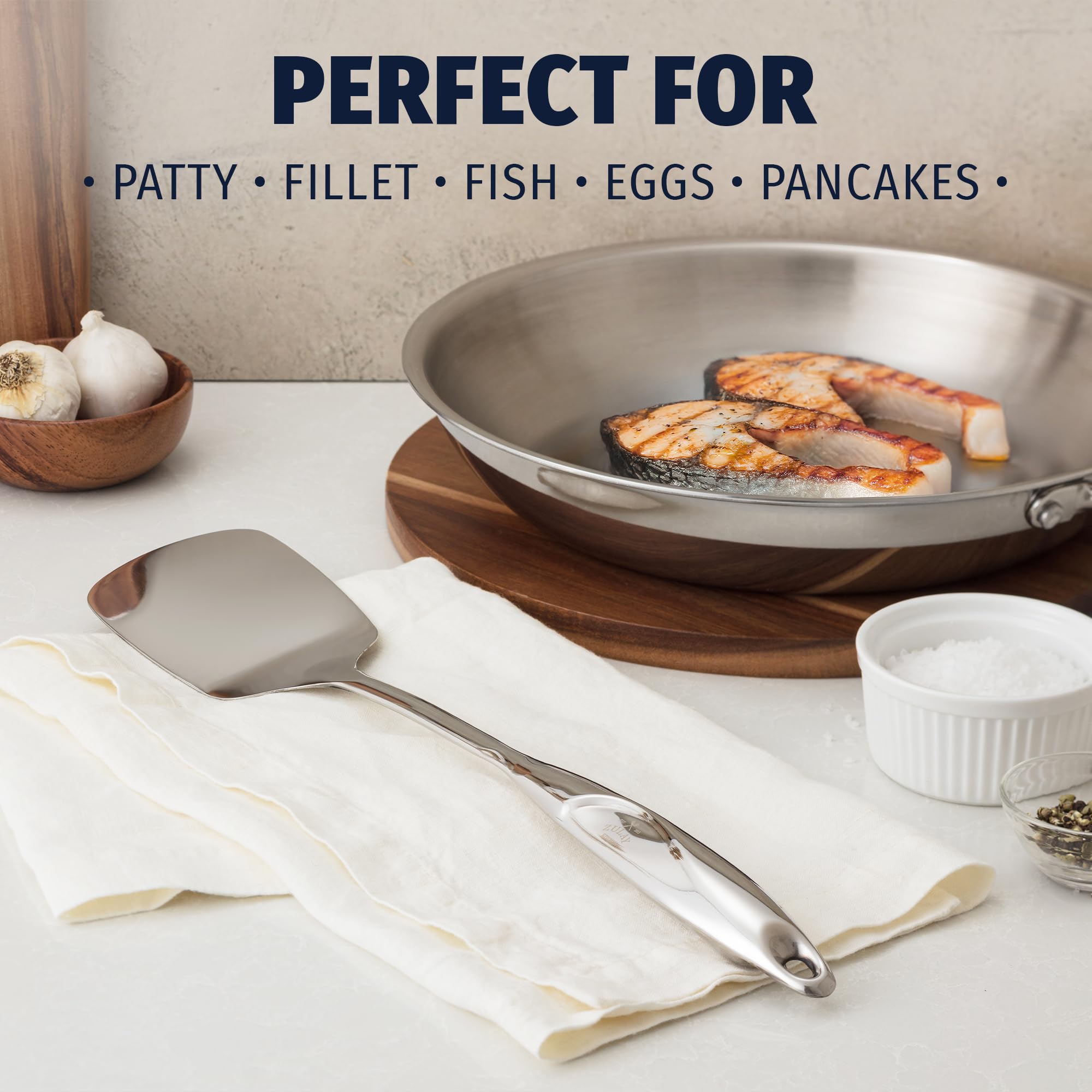 Zulay Kitchen solid turner turning eggs with precision and control