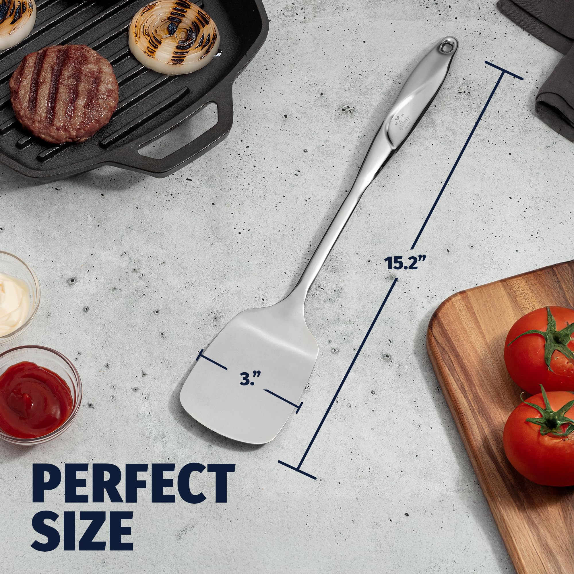 Zulay Kitchen solid turner lifting grilled vegetables without damage