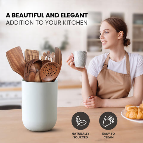 Zulay Kitchen teak slotted turner allows draining while flipping.