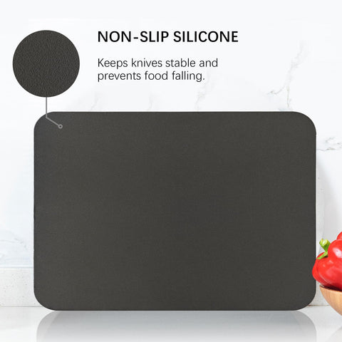 ZVP thick TPU cutting board bent to pour chopped ingredients into a pan.