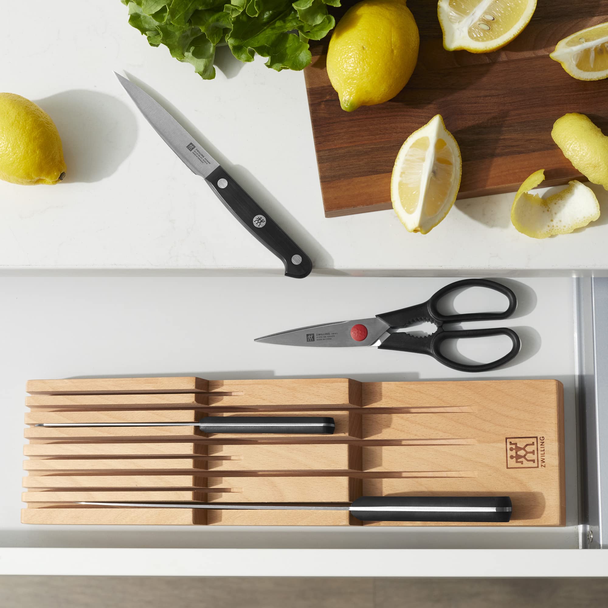 ZWILLING beechwood drawer knife storage frees counter space and protects blades.