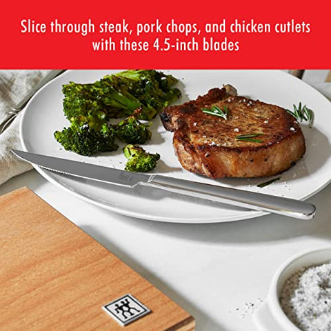 ZWILLING steak knife close-up highlights serrated edge for precise slicing.