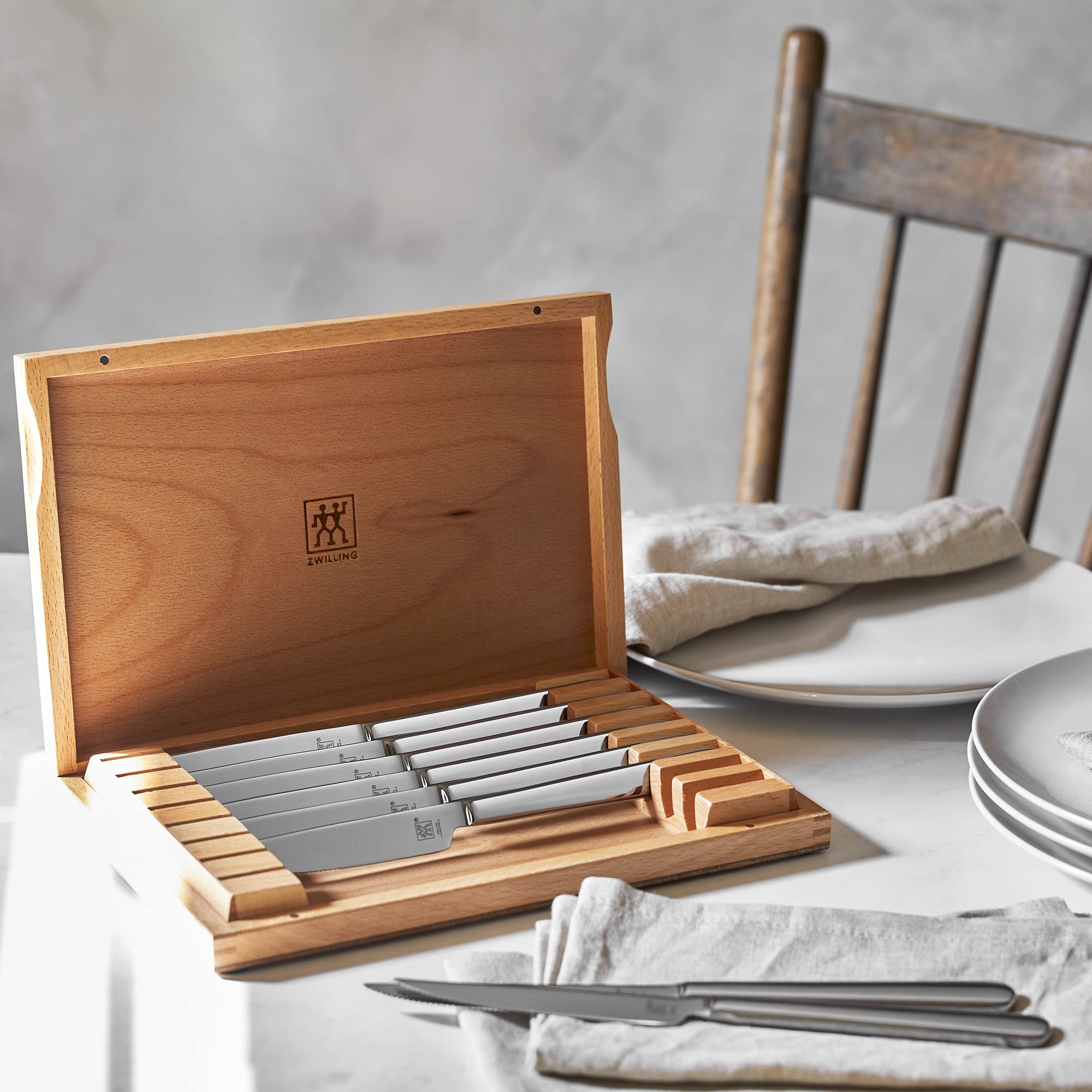 ZWILLING case open reveals eight knives ready for entertaining.