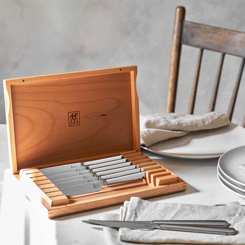 ZWILLING case open reveals eight knives ready for entertaining.