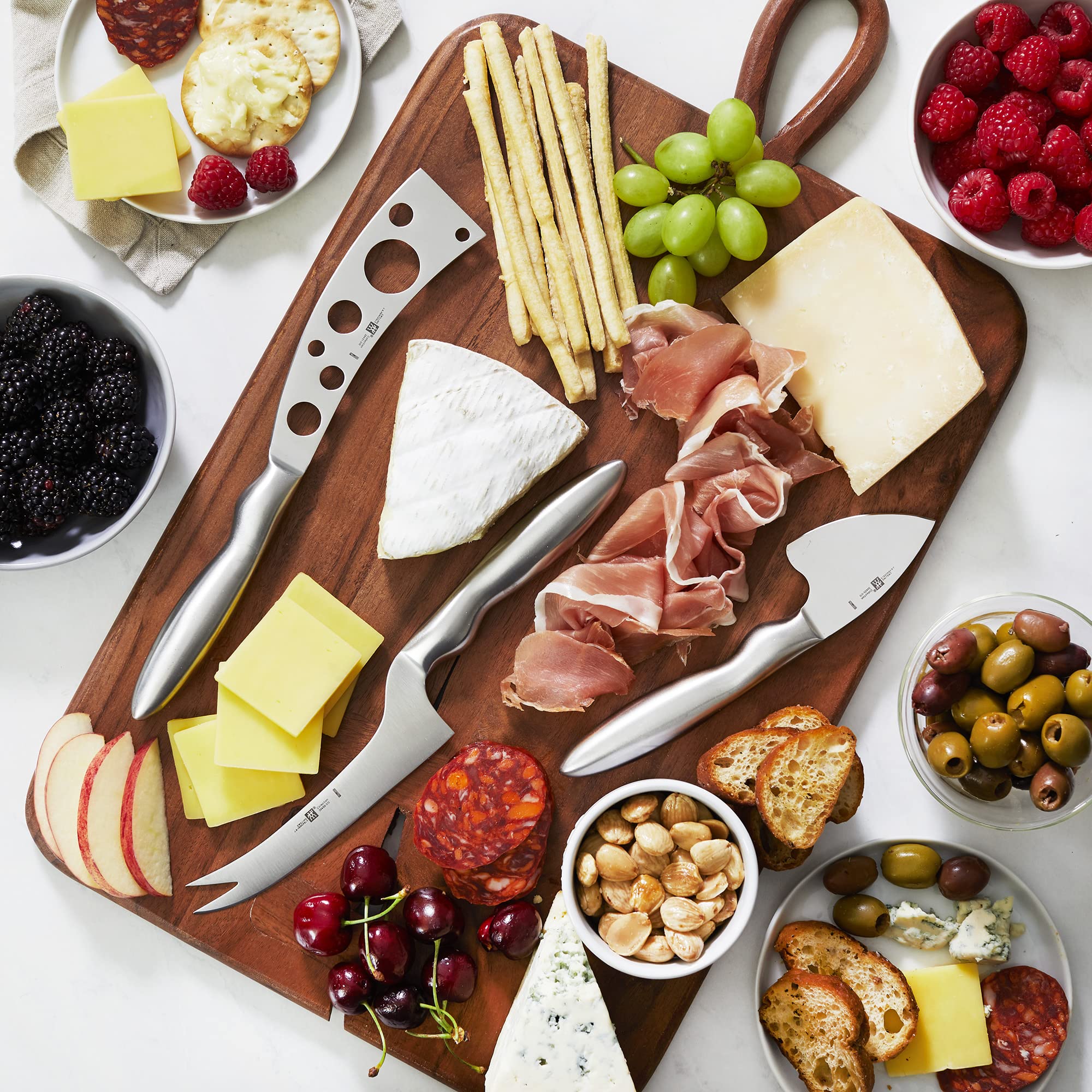 ZWILLING forked-tip cheese knife simplifies serving semi-hard and slice-ready portions.