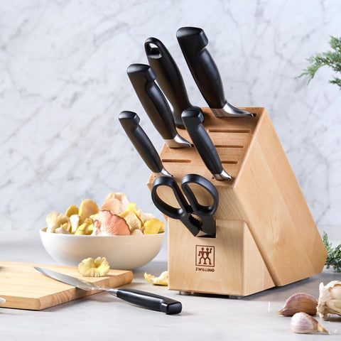 Ergonomic knife handles from ZWILLING Four Star for comfortable long use