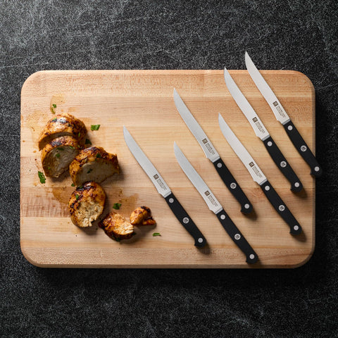 ZWILLING Gourmet precision-stamped blade closeup for durable sharpness.