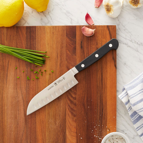 Zwilling Henckels Classic 5-inch Santoku ergonomic handle for balanced comfort during prep.