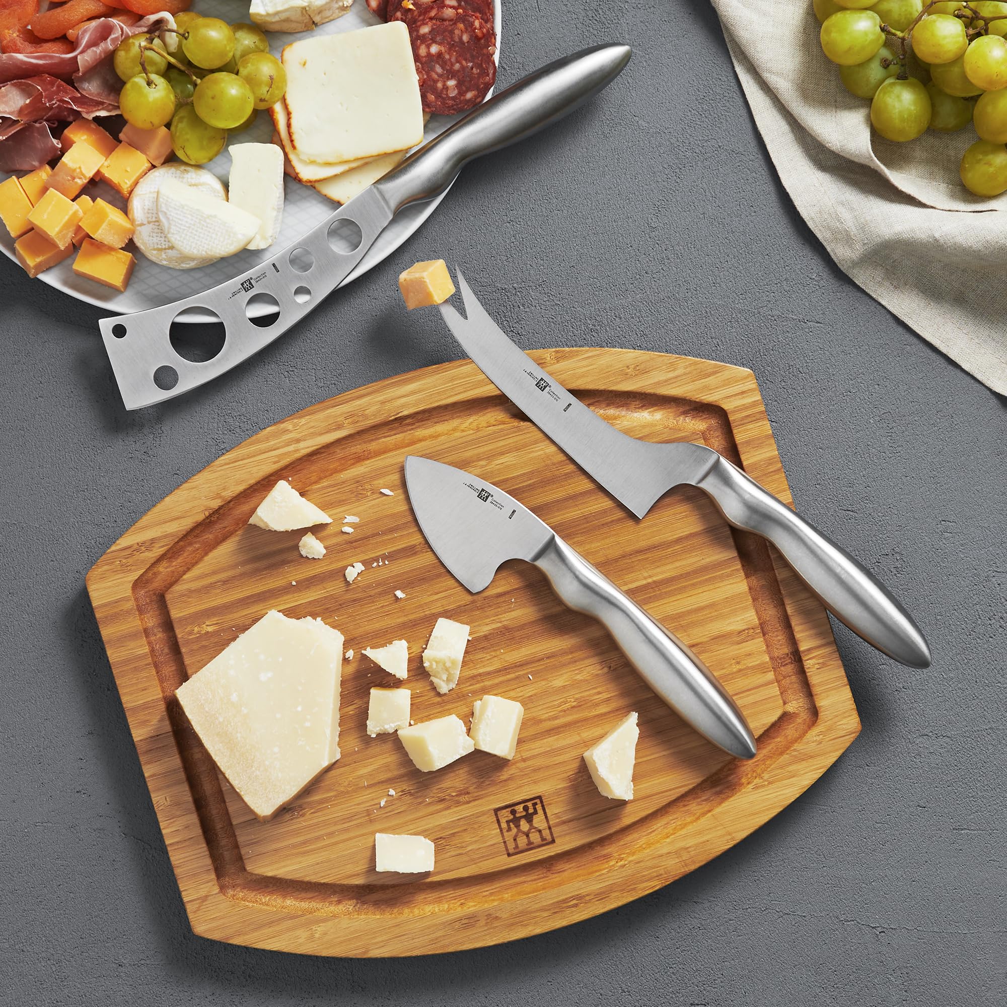 ZWILLING medium-hard cheese knife with forked tip ready for cheddar and similar cheeses.