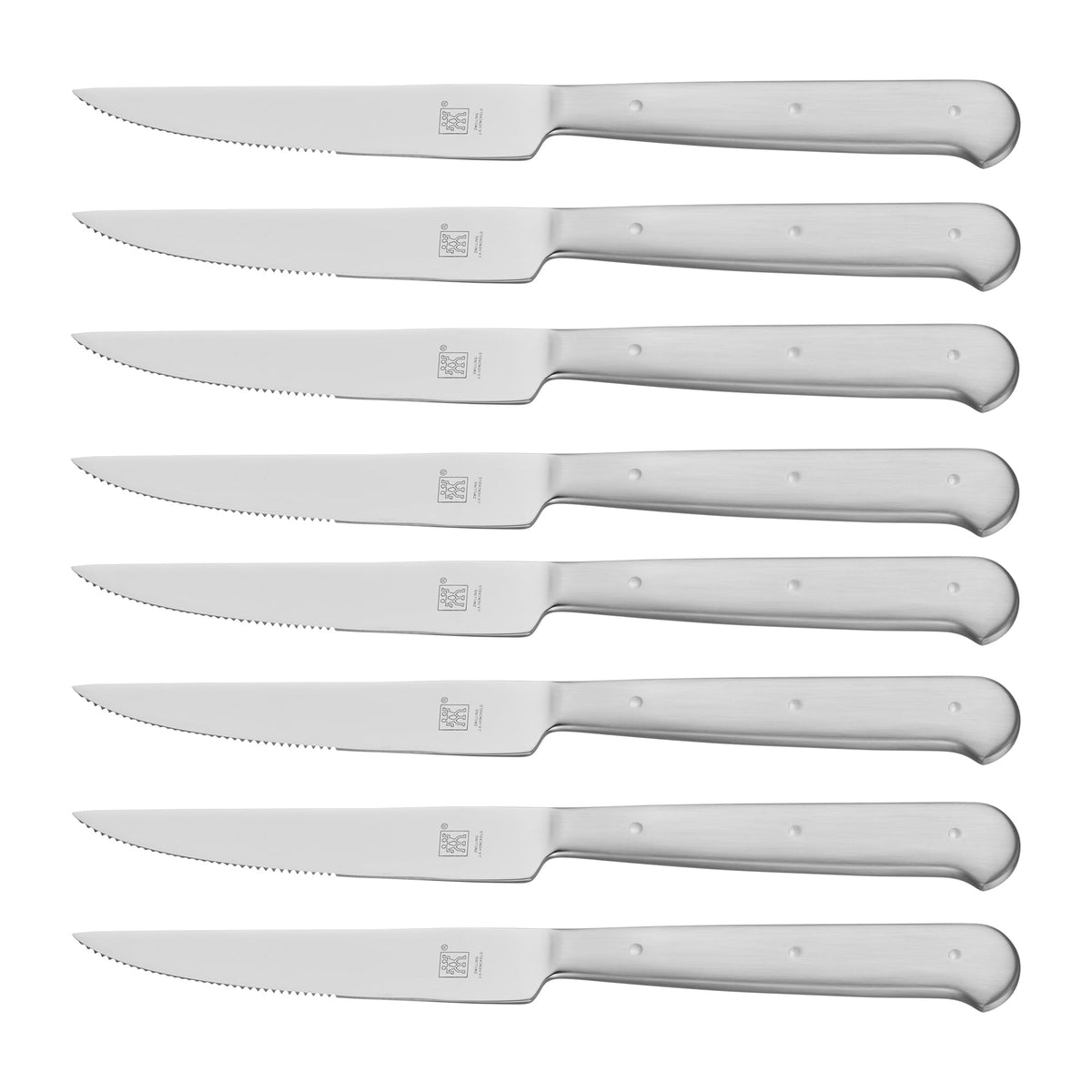 ZWILLING Porterhouse knife blade close-up showing razor-sharp edge for precise cuts.