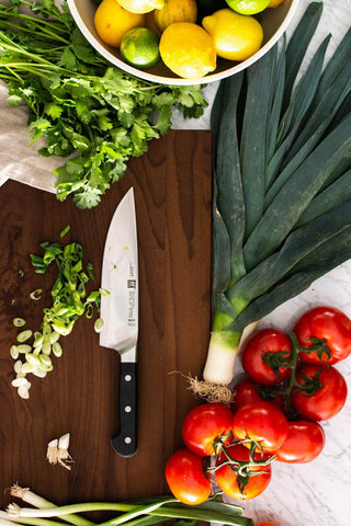 Zwilling Pro ice-hardened edge maintains sharpness for heavy daily prep tasks.
