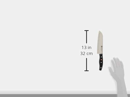 ZWILLING Twin Signature ergonomic handle; full tang for secure balance during slicing.