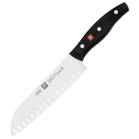 ZWILLING Twin Signature full tang construction; durable, balanced feel during slicing.