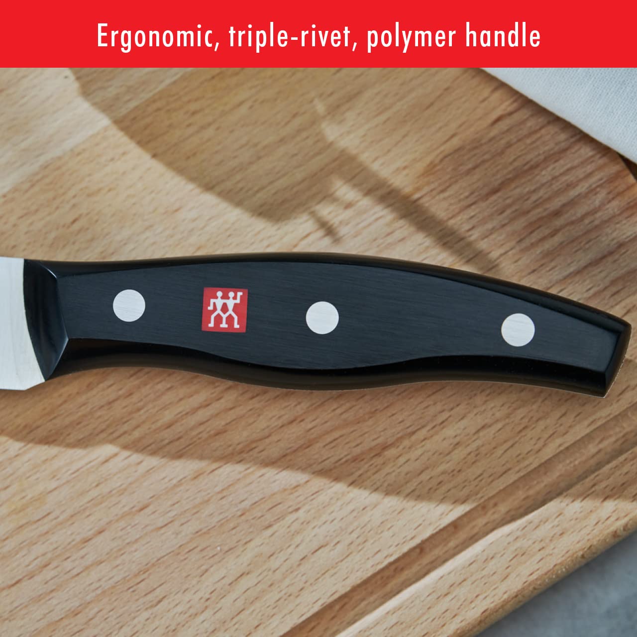 ZWILLING TWIN Signature 8-inch bread knife ergonomic handle ensures comfortable grip.