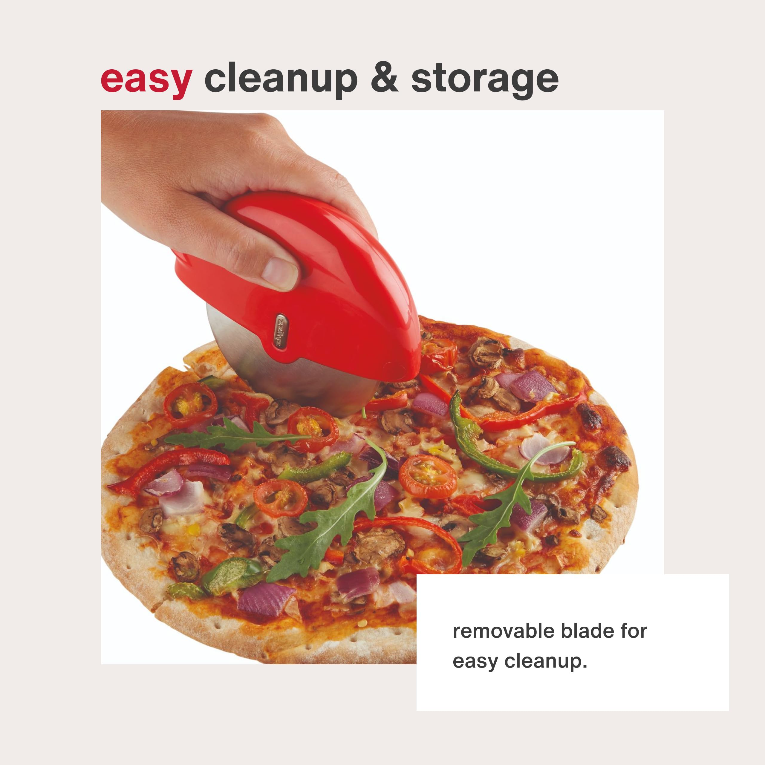 Zyliss pizza wheel in action slicing a pizza with ease.